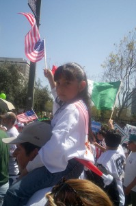 Girl in May 1st March in Los Angeles. Photo by Ruben Tapia