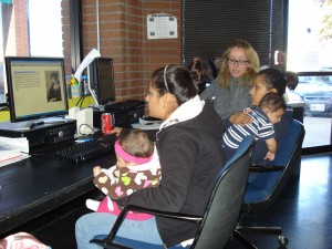 Adolescent moms at American Youthworks share a classroom with their babies. Photo: Joy Díaz.