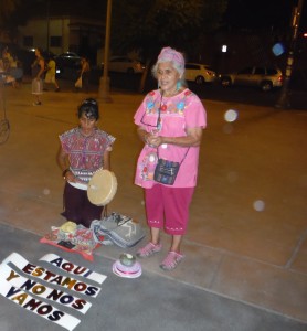 Ofelia Esparza (right) and her daughter Elena inaugurate an altar in Boyle Heights.  Photo: César Tapia.