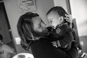 Angelica Gonzalez hold her son, a toddler, in November 2015 at the house where they are living on the Olympic Peninsula in Washington state. Photo by Mike Kane for Equal Voice News - See more at: http://www.equalvoiceforfamilies.org/the-dignity-of-living-child-cares-broken-promise/#sthash.JVvgn7ha.dpuf