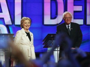 Hillary Clinton, presunta nominada demócrata a la presidencia de E.U., y el precandidato y senador por Vermont, Bernie Sanders.