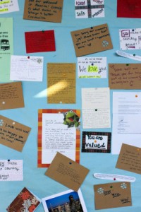 Messages of support for students are posted on several boards around the campus. The messages came from neighbors, staff, and people around the country. (Jocelyn Wiener for California Healthline)