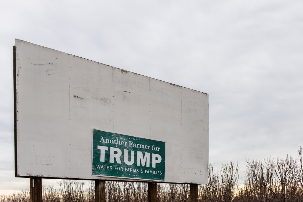 A Farmers for Trump sign posted in Tulare County on February 9, 2017. These rural areas are largely represented by Republicans in Congress who want to repeal the law, even though 55 percent of the more than 466,000 residents in Tulare were enrolled in Medi-Cal as of Jan. 2016. (Heidi de Marco/KHN)