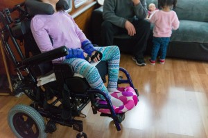 Rafael spends time with his daughters. The fear of deportation has limited the family’s time outdoors. (Heidi de Marco/KHN)