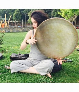 Isik Berfin plays Kurdish Alevi music on a frame drum. Photo courtesy of artist