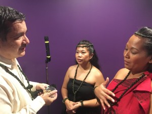 Russell Rodriguez talks with artists from Hālau Nāpuaokamokihanaoha.