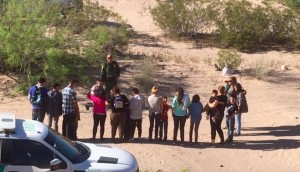 Migrants who have just crossed the border from Mexico into New Mexico near the UCP camp begin the process of requesting asylum on April 19, 2019. 